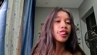 A Tiny Asian Girl With Petite Features