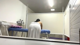 Latina Nurse With Big Natural Tits Massages Oil On A Patient'S Butt In The Office